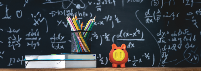 Teacher desk withbooks and pencils